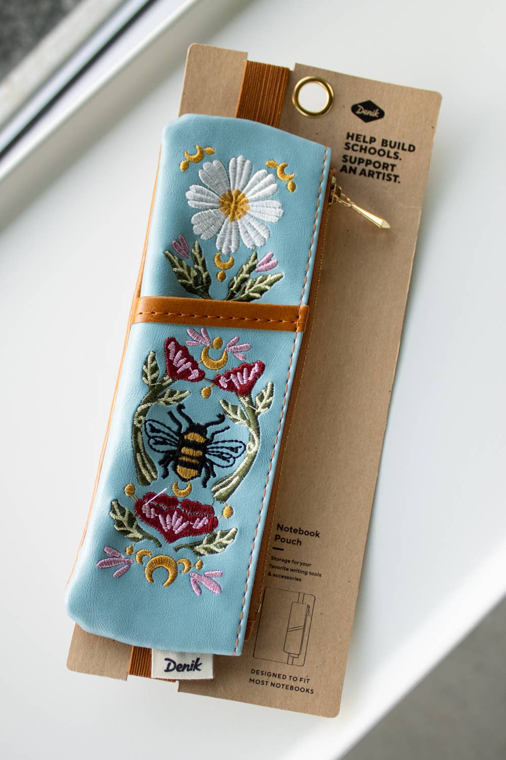 Embroidered pencil case with floral and bee design
